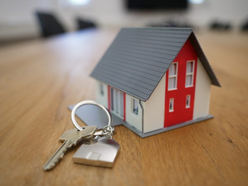 Single key with a little house next to it