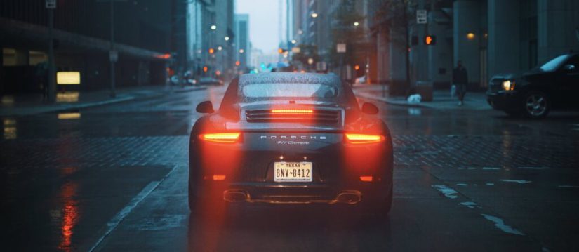 Back of porsche in a city