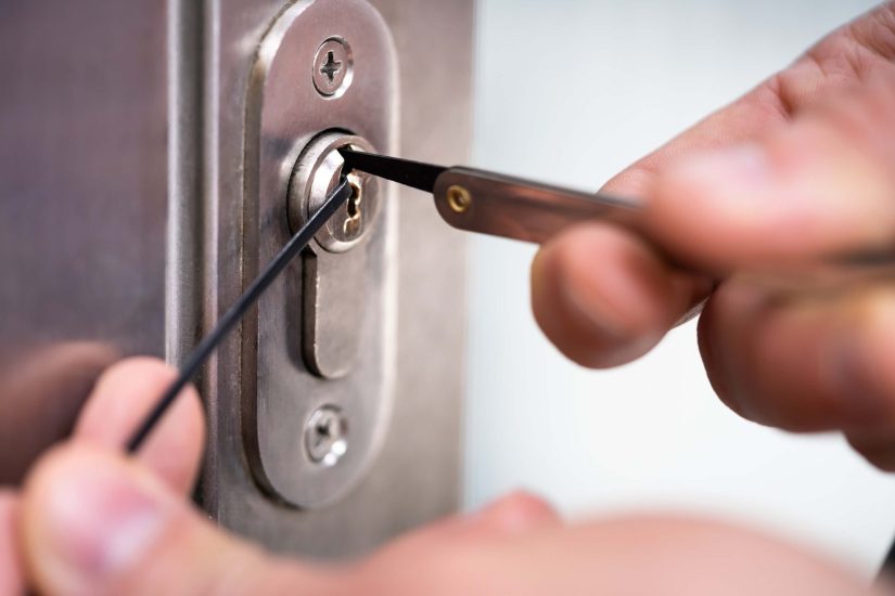 Locksmith Man Fixing Door Lock